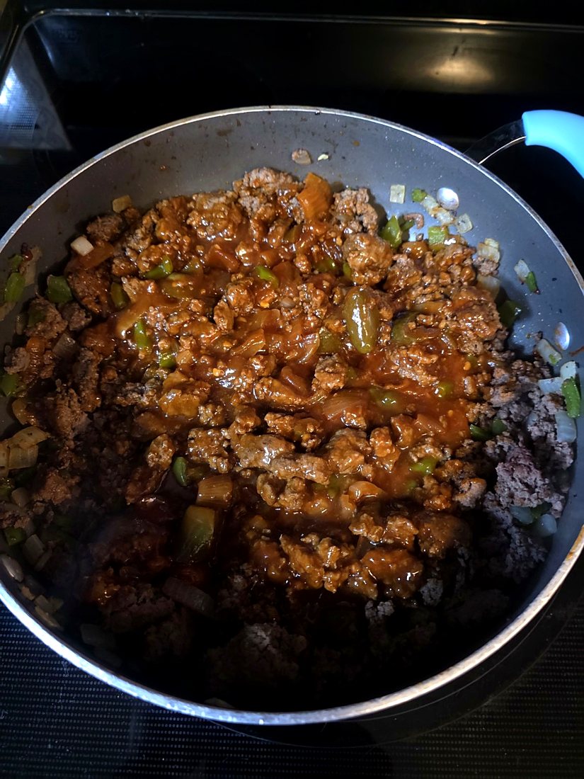 Sloppy slider beef and vegetables simmering in SMH grill sauce